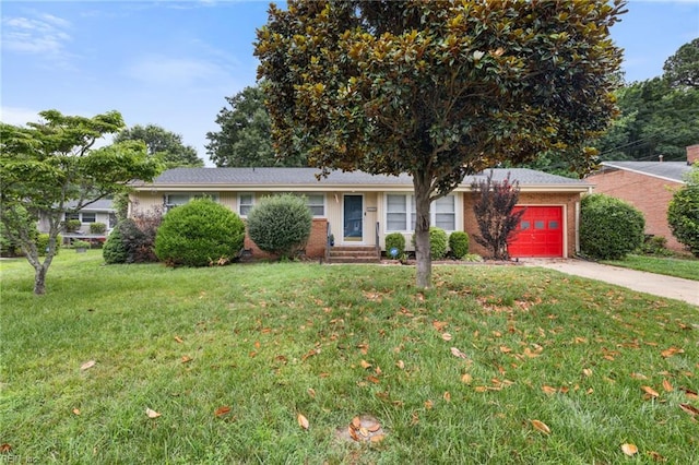 701 Milton Dr, Hampton, VA 23666 - single story home with an attached garage, a front yard, and concrete driveway