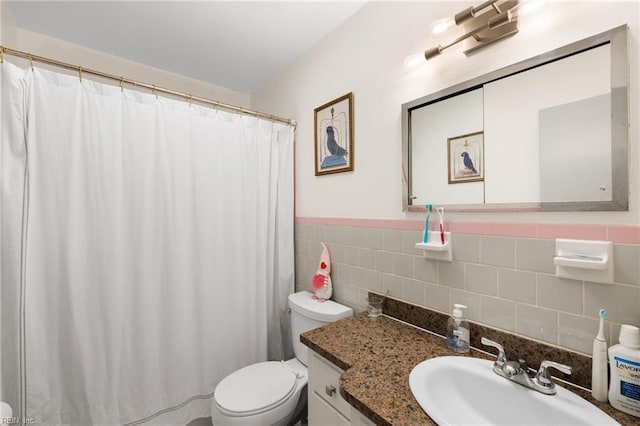 701 Milton Dr, Hampton, VA 23666 - bathroom with vanity, tile walls, curtained shower, and wainscoting