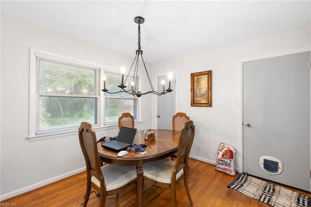 701 Milton Dr, Hampton, VA 23666 - dining room featuring a chandelier and light wood-type flooring