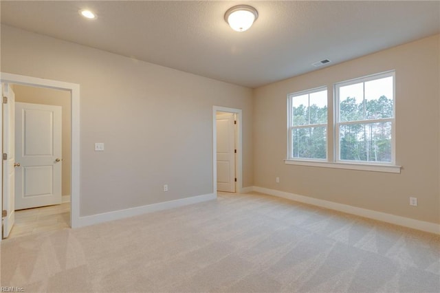 1501 Cedarville Ct, Chesapeake, VA 23322 - spare room featuring light colored carpet and recessed lighting