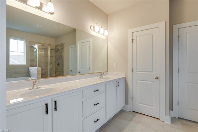 1501 Cedarville Ct, Chesapeake, VA 23322 - bathroom featuring a stall shower, double vanity, and tile patterned floors