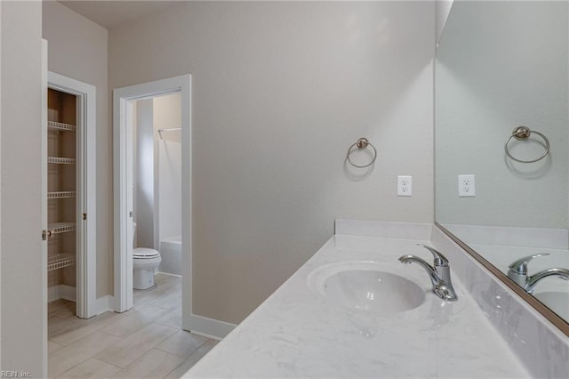 1501 Cedarville Ct, Chesapeake, VA 23322 - bathroom featuring vanity, tile patterned flooring, a spacious closet, and shower / bath combination