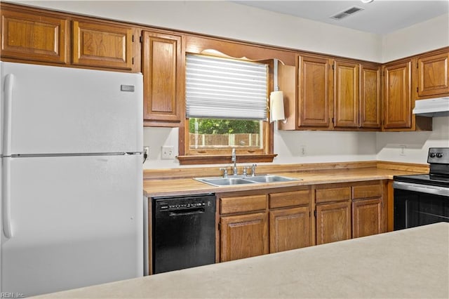 128 Glen Echo Dr, Norfolk, VA 23505 - kitchen featuring freestanding refrigerator, black dishwasher, electric range, light countertops, and under cabinet range hood