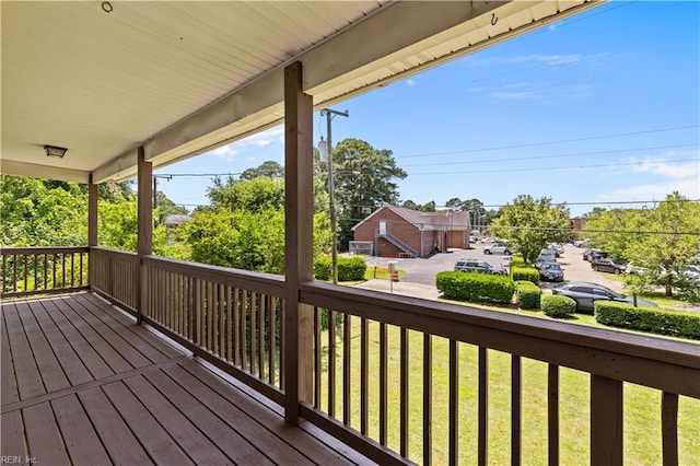 128 Glen Echo Dr, Norfolk, VA 23505 - wooden deck featuring a lawn