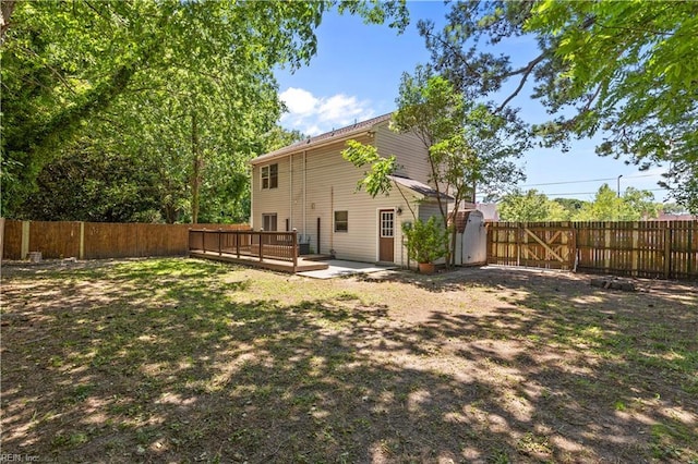 128 Glen Echo Dr, Norfolk, VA 23505 - rear view of house with a fenced backyard and a deck