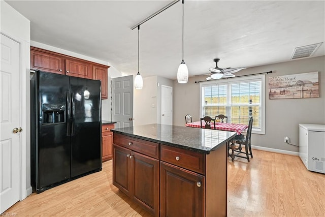 742 Milby Dr, Chesapeake, VA 23325 - kitchen with black fridge with ice dispenser, light wood-type flooring, a ceiling fan, and a kitchen island