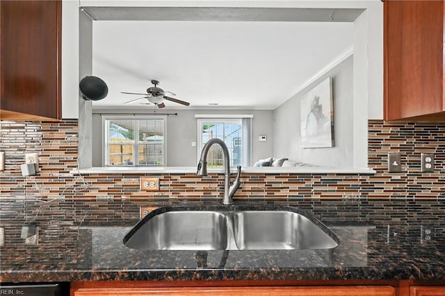 742 Milby Dr, Chesapeake, VA 23325 - kitchen with decorative backsplash, dark stone counters, ornamental molding, and ceiling fan