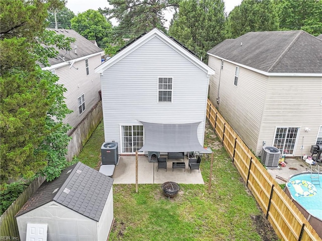 742 Milby Dr, Chesapeake, VA 23325 - back of property with an outdoor fire pit, a patio area, and a fenced backyard