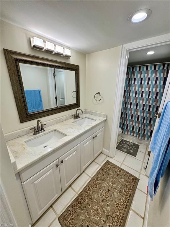 508 Virginia Dare Dr, Virginia Beach, VA 23451 - bathroom featuring double vanity, tile patterned flooring, and a shower with curtain