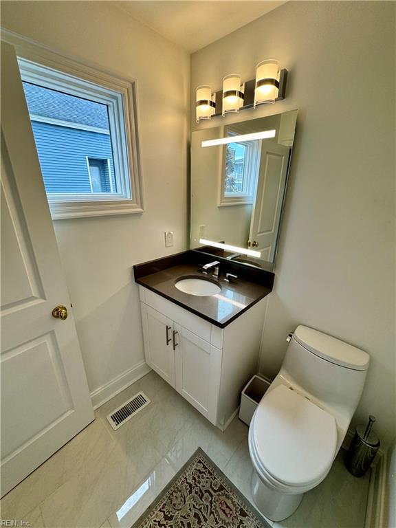 508 Virginia Dare Dr, Virginia Beach, VA 23451 - half bath with vanity and marble finish floors