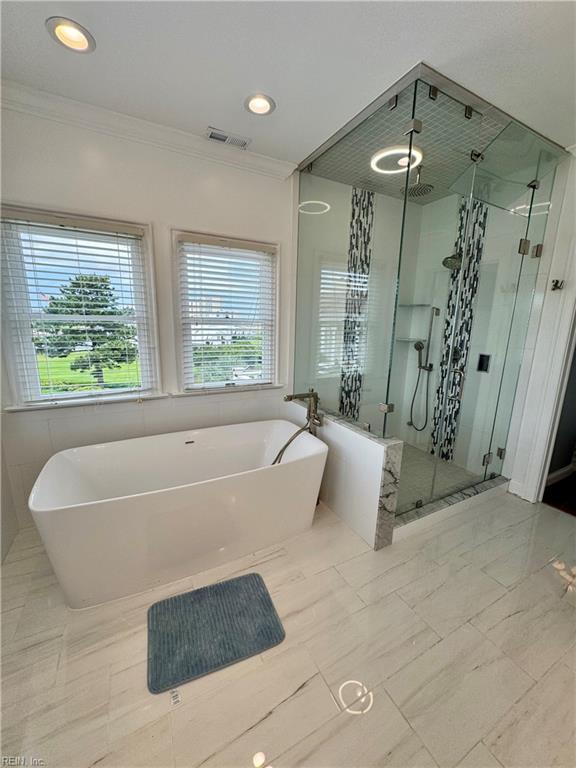 508 Virginia Dare Dr, Virginia Beach, VA 23451 - bathroom with a soaking tub, a shower stall, crown molding, and recessed lighting