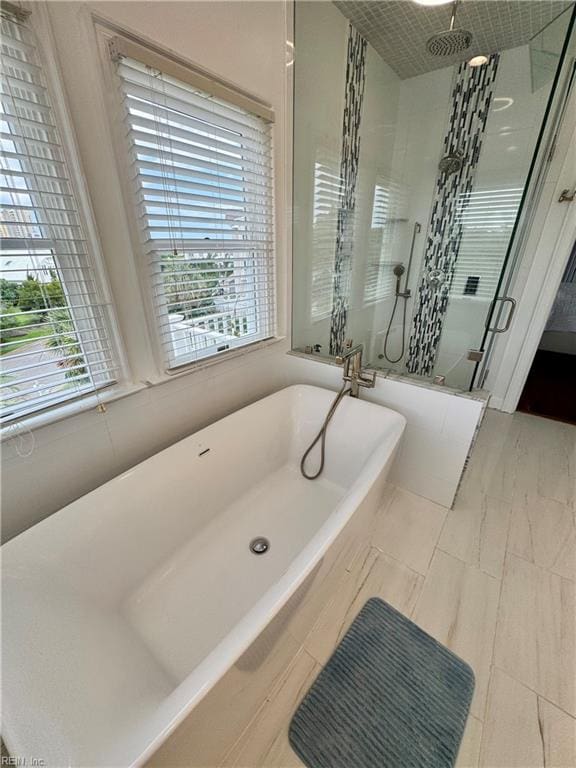 508 Virginia Dare Dr, Virginia Beach, VA 23451 - bathroom with a stall shower, healthy amount of natural light, and a freestanding tub