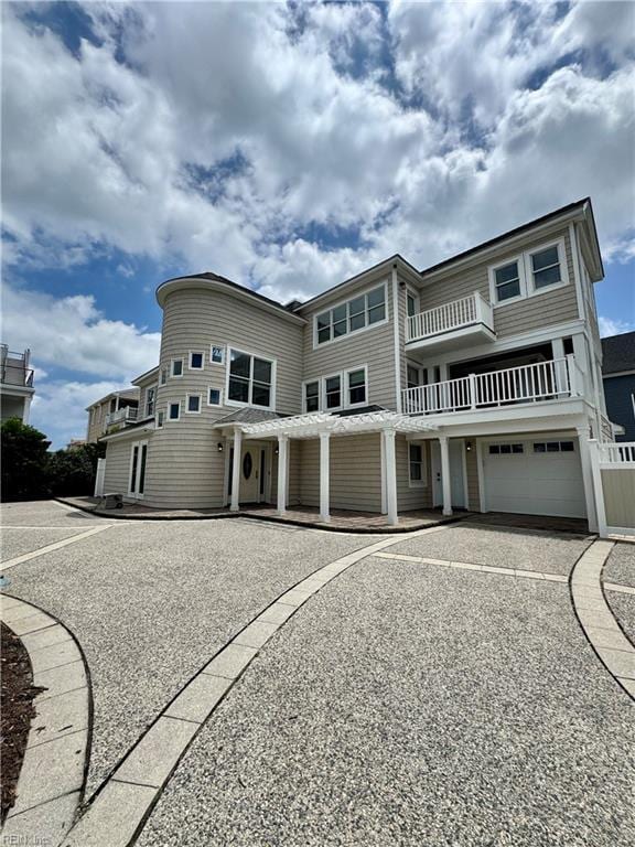 508 Virginia Dare Dr, Virginia Beach, VA 23451 - view of front of property featuring an attached garage, a balcony, and driveway