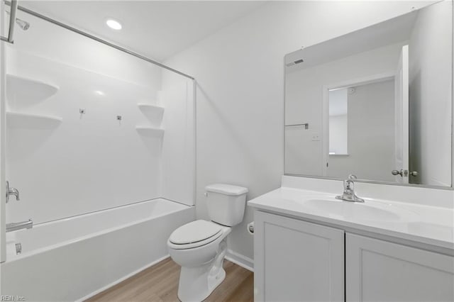 1506 Waltham Ln, Newport News, VA 23608 - bathroom with wood finished floors, vanity, shower / bath combination, and recessed lighting