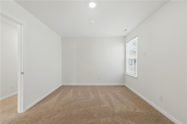 1506 Waltham Ln, Newport News, VA 23608 - unfurnished room featuring light carpet and baseboards
