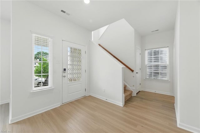 1506 Waltham Ln, Newport News, VA 23608 - foyer with light wood-style floors and stairs