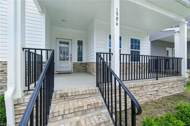 1506 Waltham Ln, Newport News, VA 23608 - view of exterior entry featuring a porch and stone siding