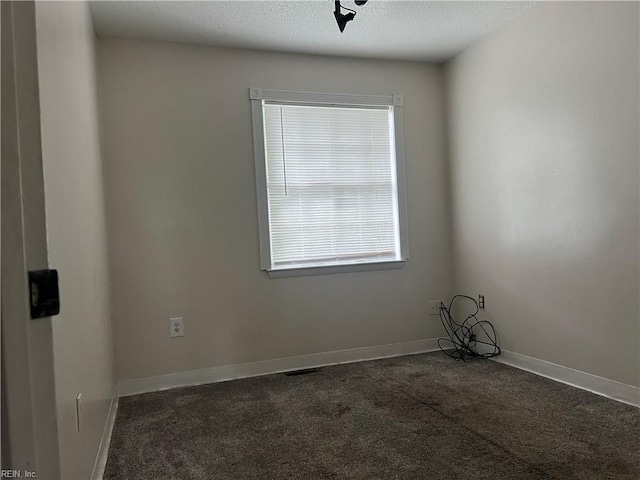 2102 King James Ct, Carrollton, VA 23314 - carpeted spare room featuring healthy amount of natural light and a textured ceiling
