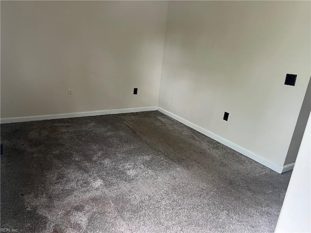 2102 King James Ct, Carrollton, VA 23314 - unfurnished room featuring baseboards and dark colored carpet