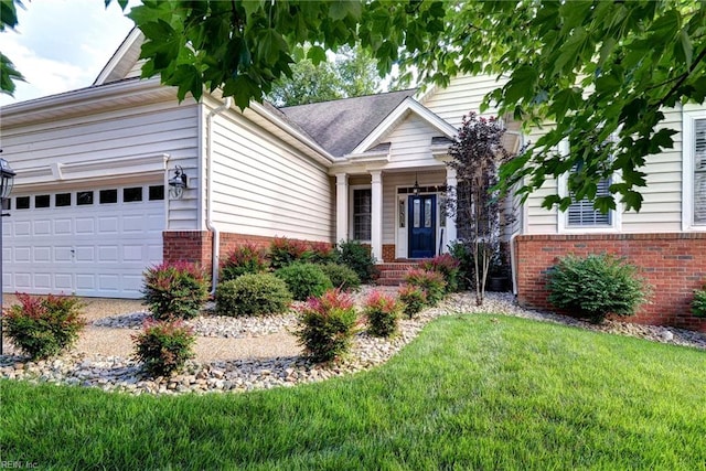 4708 Winterberry Ct, Williamsburg, VA 23188 - view of front facade with brick siding, an attached garage, and a front lawn
