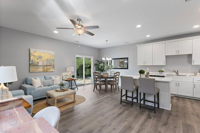 31 Bank St, Windsor, VA 23487 - living area featuring recessed lighting, ceiling fan, a chandelier, and dark wood-style floors