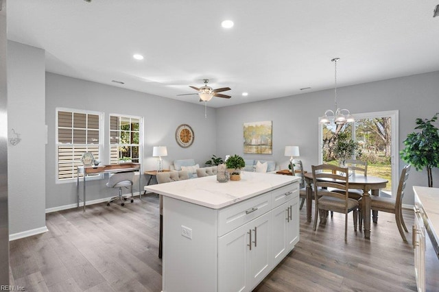 31 Bank St, Windsor, VA 23487 - kitchen with recessed lighting, healthy amount of natural light, ceiling fan, and wood finished floors