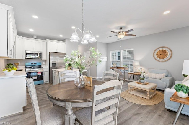 31 Bank St, Windsor, VA 23487 - dining area with ceiling fan, light wood-style floors, recessed lighting, and a chandelier