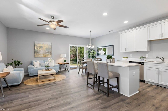 31 Bank St, Windsor, VA 23487 - kitchen featuring stainless steel dishwasher, recessed lighting, a center island, light countertops, and white cabinetry