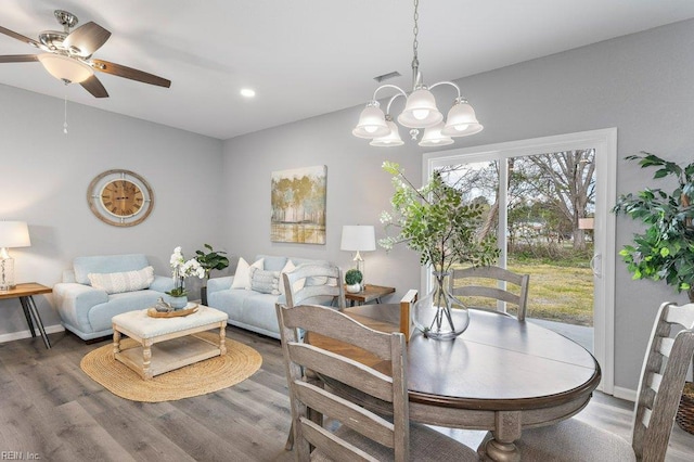 31 Bank St, Windsor, VA 23487 - dining space with a ceiling fan, a chandelier, wood finished floors, and recessed lighting