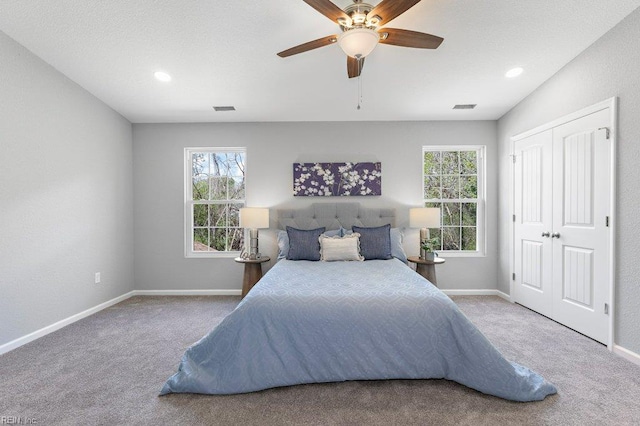31 Bank St, Windsor, VA 23487 - bedroom featuring carpet floors, a ceiling fan, a closet, and recessed lighting