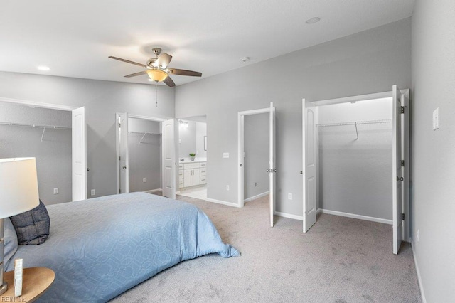 31 Bank St, Windsor, VA 23487 - carpeted bedroom featuring a walk in closet, ensuite bath, and ceiling fan
