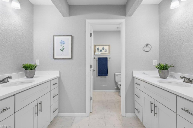 31 Bank St, Windsor, VA 23487 - bathroom featuring vanity and a textured wall