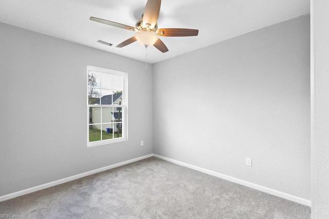 31 Bank St, Windsor, VA 23487 - carpeted spare room with ceiling fan and baseboards