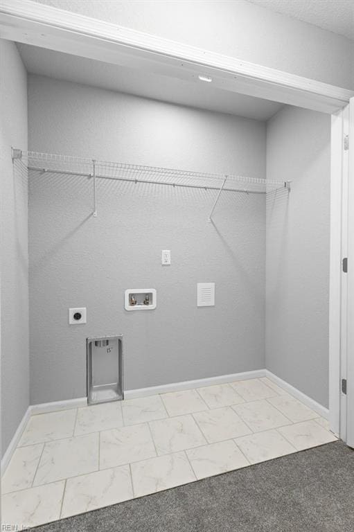 31 Bank St, Windsor, VA 23487 - washroom featuring washer hookup, hookup for an electric dryer, and light marble finish floors