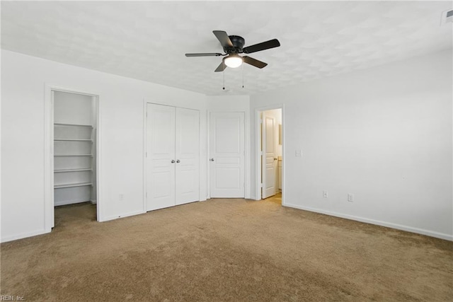 3494 Prices Fork Blvd, Suffolk, VA 23435 - unfurnished bedroom featuring carpet floors, two closets, and ceiling fan