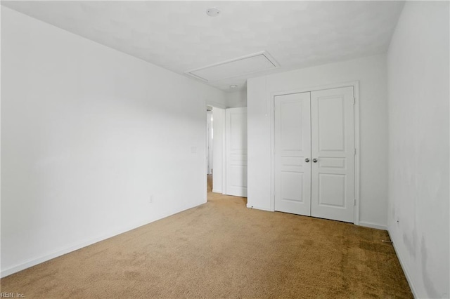 3494 Prices Fork Blvd, Suffolk, VA 23435 - unfurnished bedroom with attic access, carpet floors, and a closet