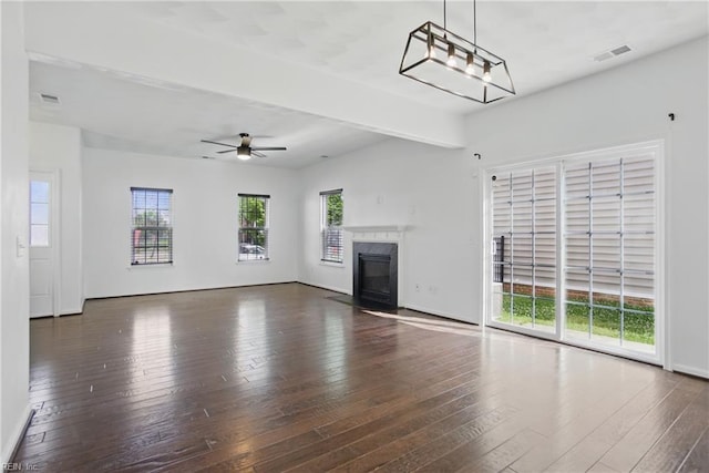 3494 Prices Fork Blvd, Suffolk, VA 23435 - unfurnished living room with plenty of natural light, a ceiling fan, hardwood / wood-style flooring, and a fireplace with flush hearth