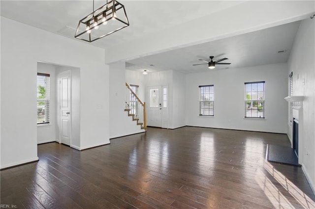 3494 Prices Fork Blvd, Suffolk, VA 23435 - unfurnished living room with stairs, healthy amount of natural light, a ceiling fan, and a fireplace with raised hearth