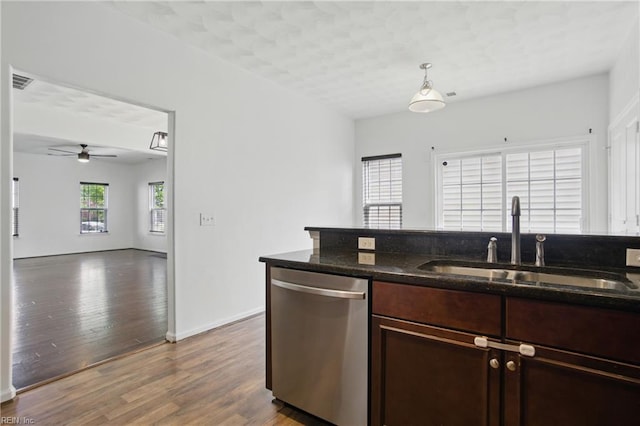 3494 Prices Fork Blvd, Suffolk, VA 23435 - kitchen with dishwasher, dark stone counters, wood finished floors, and dark brown cabinetry
