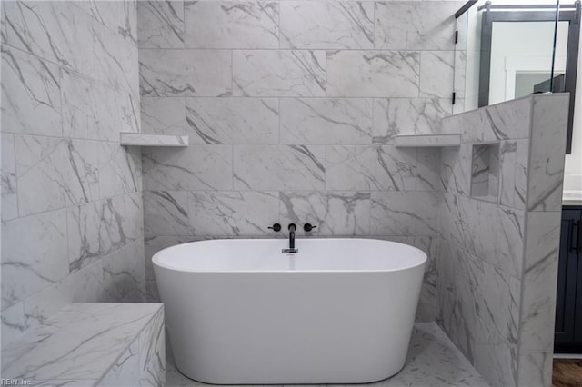 18052 Foxfire Trl, Windsor, VA 23487 - full bath with a soaking tub, vanity, and tile walls