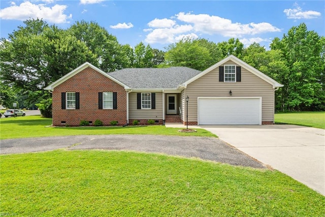 15110 Ashby Way, Carrollton, VA 23314 - ranch-style house featuring concrete driveway, crawl space, an attached garage, and a front yard