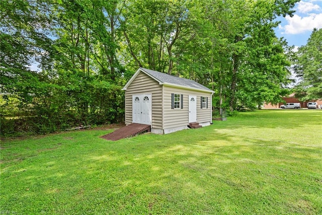 15110 Ashby Way, Carrollton, VA 23314 - view of green lawn featuring an outdoor structure