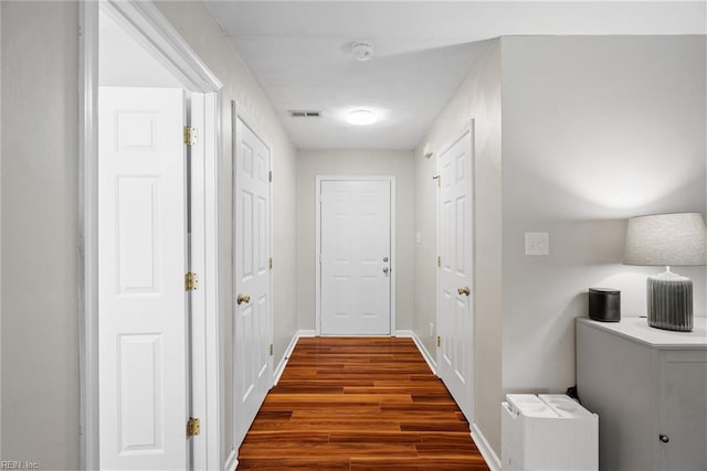 15110 Ashby Way, Carrollton, VA 23314 - hallway with dark wood finished floors and baseboards