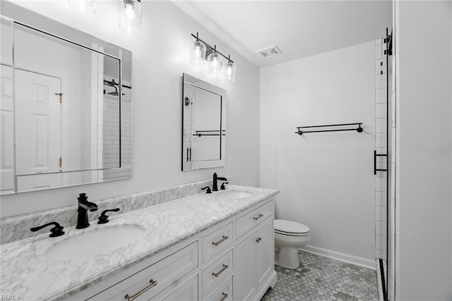15110 Ashby Way, Carrollton, VA 23314 - bathroom with double vanity, a shower stall, and tile patterned flooring