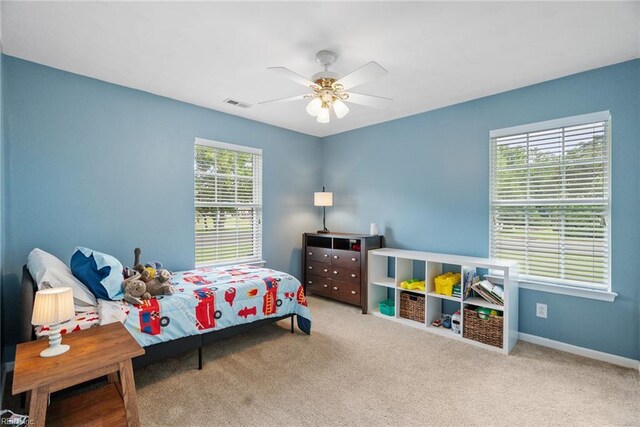 15110 Ashby Way, Carrollton, VA 23314 - carpeted bedroom featuring baseboards and a ceiling fan