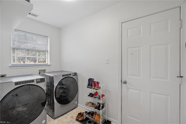 15110 Ashby Way, Carrollton, VA 23314 - laundry area with independent washer and dryer and baseboards