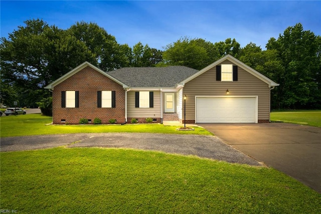 15110 Ashby Way, Carrollton, VA 23314 - ranch-style home with crawl space, asphalt driveway, a garage, and a front yard