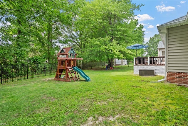 15110 Ashby Way, Carrollton, VA 23314 - fenced backyard with a playground and a wooden deck
