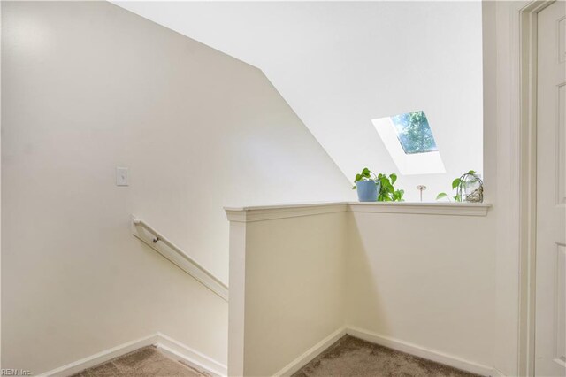 164 Corwin Cir, Hampton, VA 23666 - stairs featuring a skylight, carpet floors, and vaulted ceiling