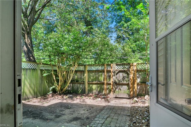 164 Corwin Cir, Hampton, VA 23666 - fenced backyard with a patio